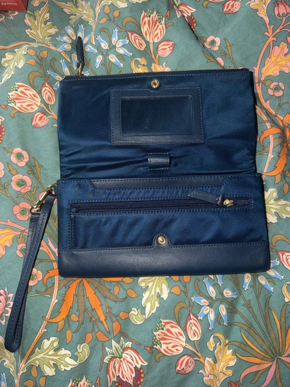 Tumi Navy Fold-Over Wristlet Clutch with Gold Hardware
